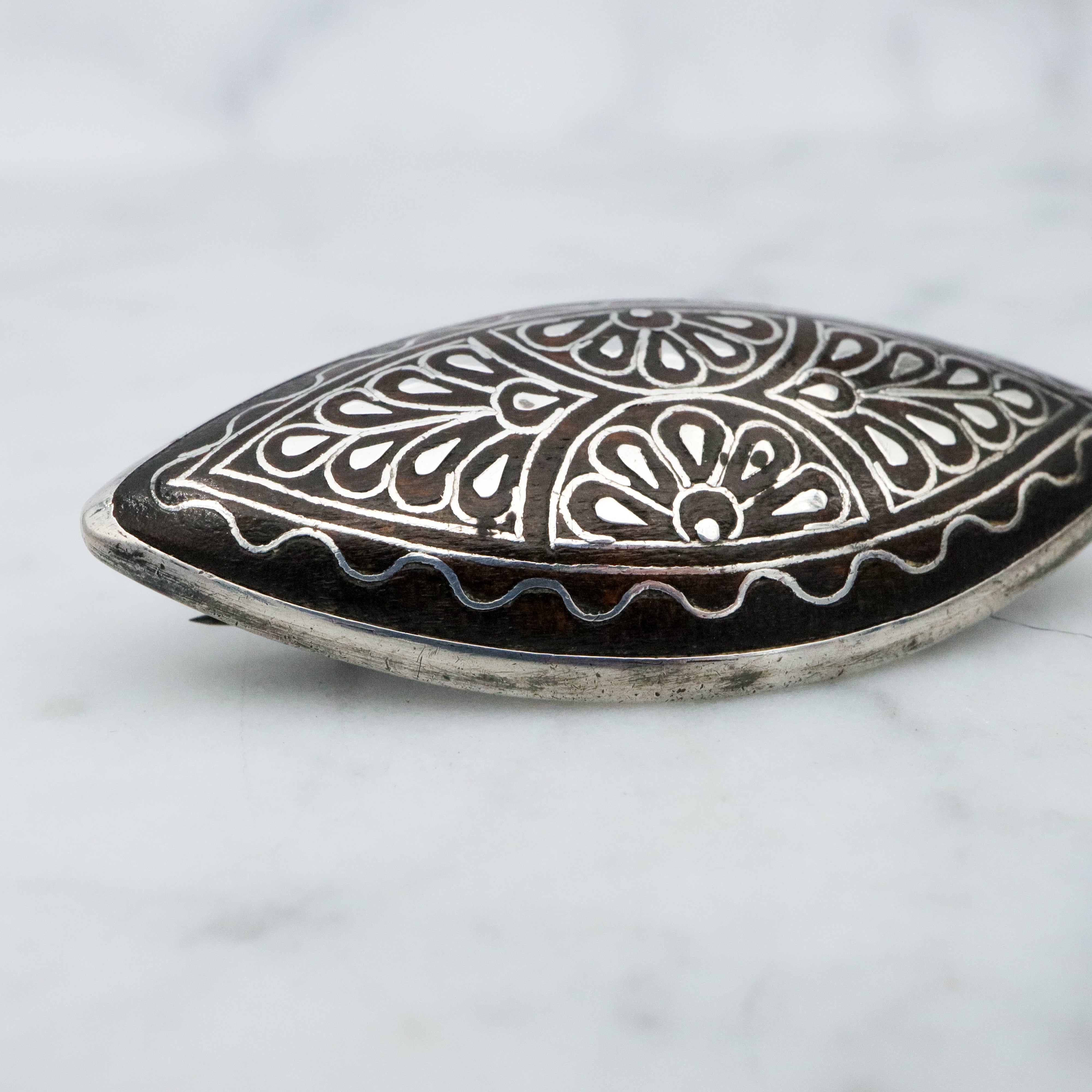 Antique Victorian silver inlaid wood elliptical brooch
